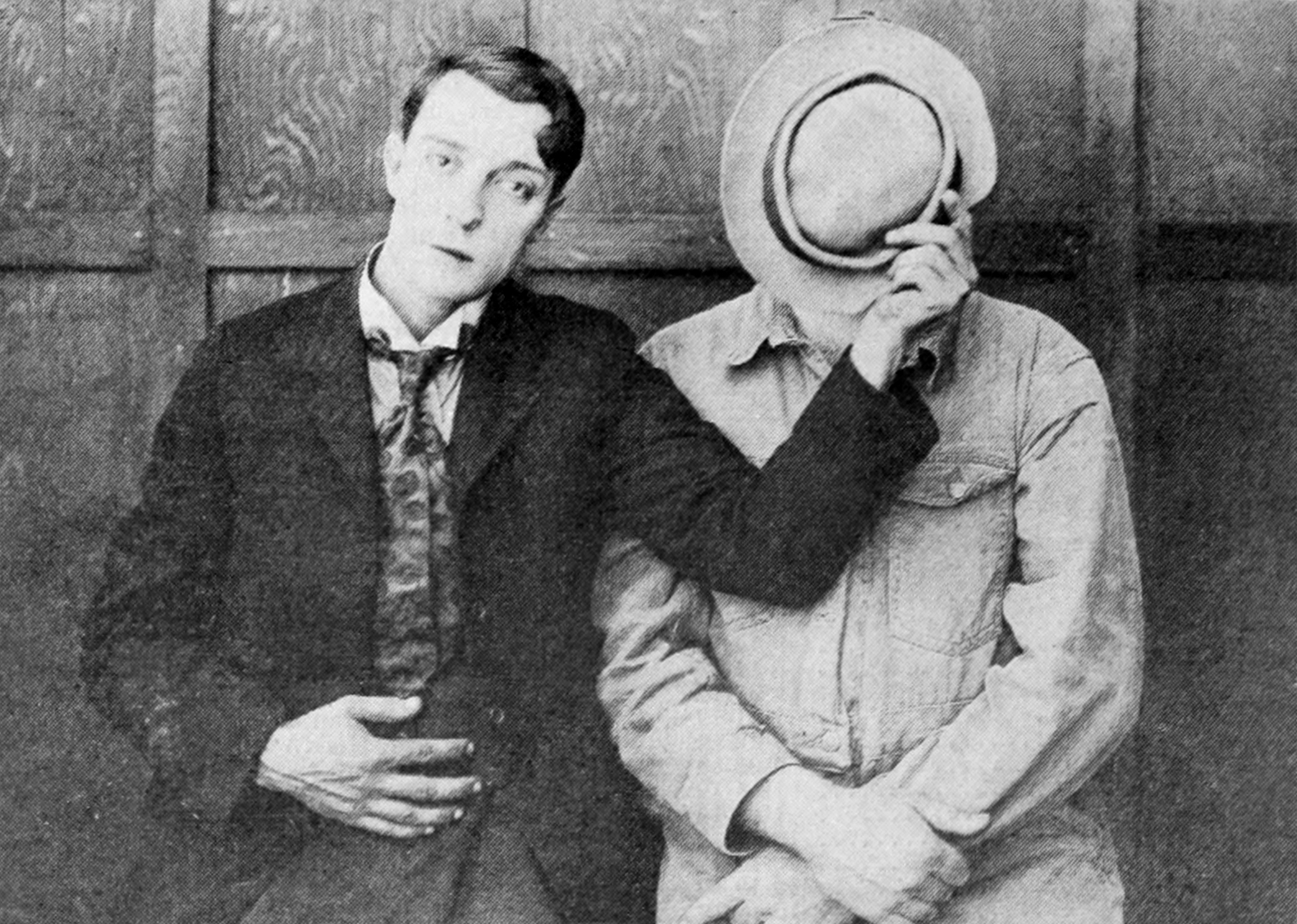 Buster Keaton and filmmaker Edward F. Cline stand together in a 1920 Metro Pictures publicity photograph.