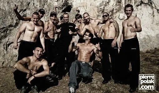 Ferdi Fischer and the team pose in front of Burgsteinfelsen after the stunt.